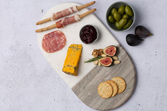 An oval marble serving board