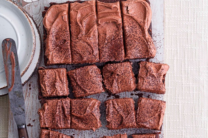 Children's Chocolate Birthday Cake Recipe (Sheet Cake) Chocolate sheet cake cut into squares