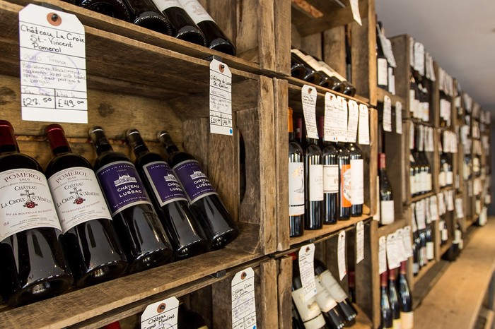 Wine bottles on wooden shelving