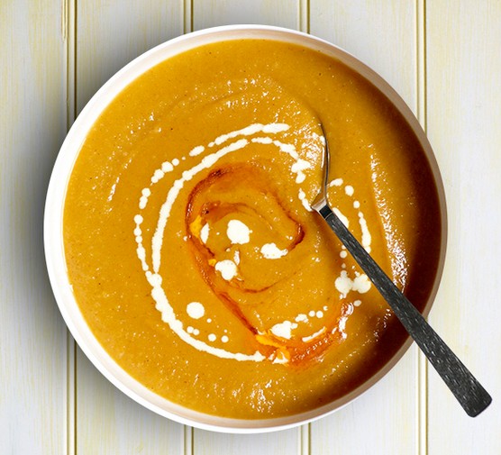 Bowl of parsnip soup, with a swirl of creme fraiche