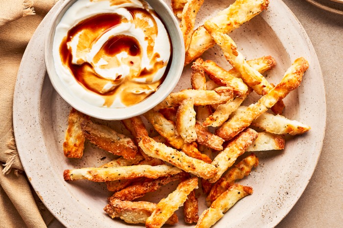 Plate of halloumi fries with a greek yoghurt dip