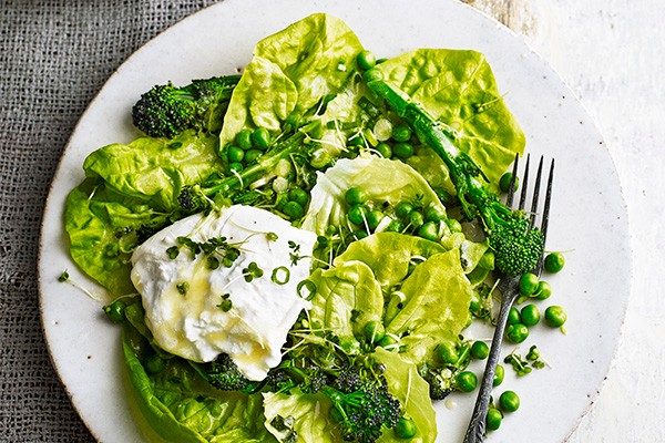 Spring Salad Recipe with Broccoli, Peas and Mozzarella served on a white plate and a white surface