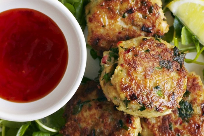 Chilli and ginger crab cakes with watercress and a pot of dipping sauce