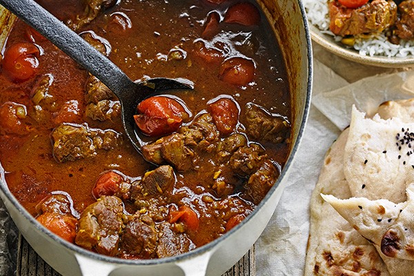 Lamb and tomato curry with mint yogurt