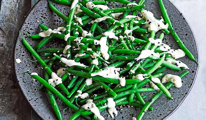 Green beans with confit garlic and tahini dressing