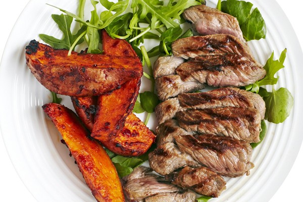 Lamb steaks with harissa-roasted sweet potatoes