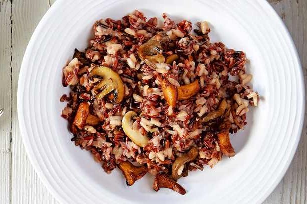 Wild rice and mushroom risotto with roast garlic