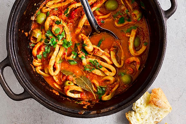 Slow-cooked squid with olives and tomatoes