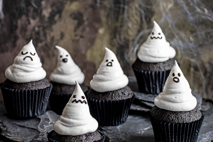 Halloween ghost-shaped black cupcakes