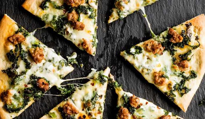 Smoky sausage and kale pizza