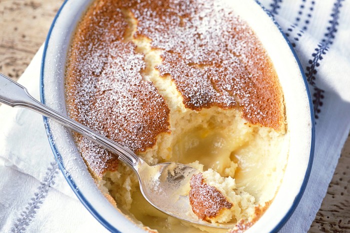 Lemon Self Saucing Pudding (Lemon surprise pudding) Spoon in a yellow lemon pudding with a crisp top