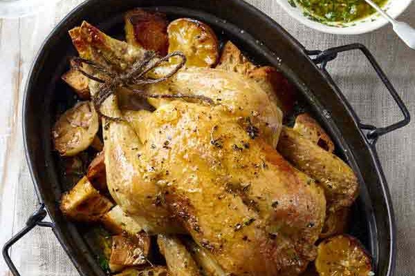 Roast chicken with garlic and thyme croutons recipe