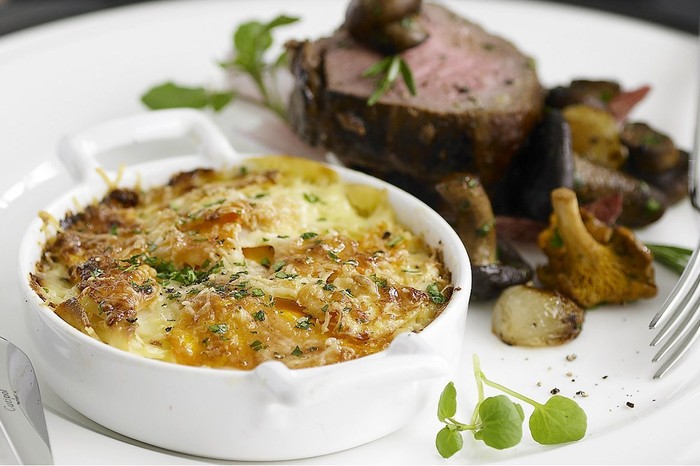 Parsnip gratin in dish on plate