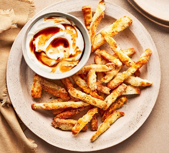 A plate of halloumi fries with a Greek yogurt dip