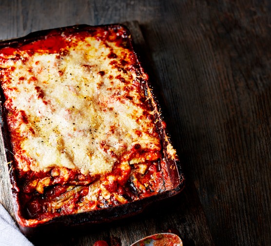 Aubergine Parmigiana topped with Melted Cheese in a Roasting Dish