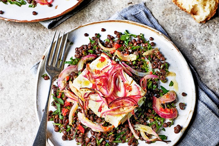 Lentil Salad Recipe with Feta Lentil Salad Recipe with Feta and crunchy bread. Served on a white plate with a blue napkin on a grey table.