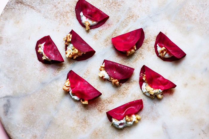 Pickled beetroot mini tacos with goat's cheese and walnuts