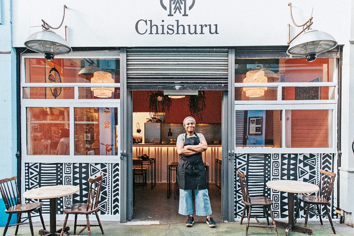 Adjoké ‘Joké’ Bakare standing outside Chishuru's shopfront