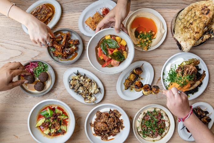 A selection of small plates at Bubble, including hummus, falafel, corn, cauliflower and leeks