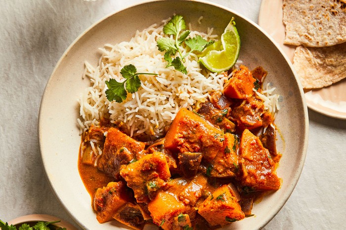 Butternut squash curry a bowl of butternut squash curry with rice