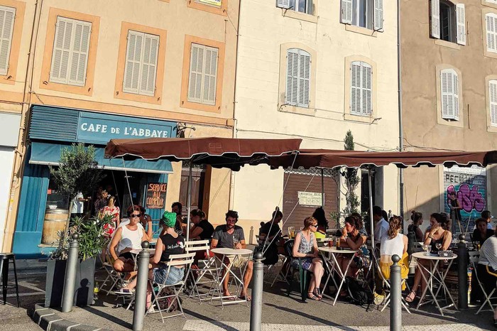 Tables outside Cafe de L'Abbaye Marseille