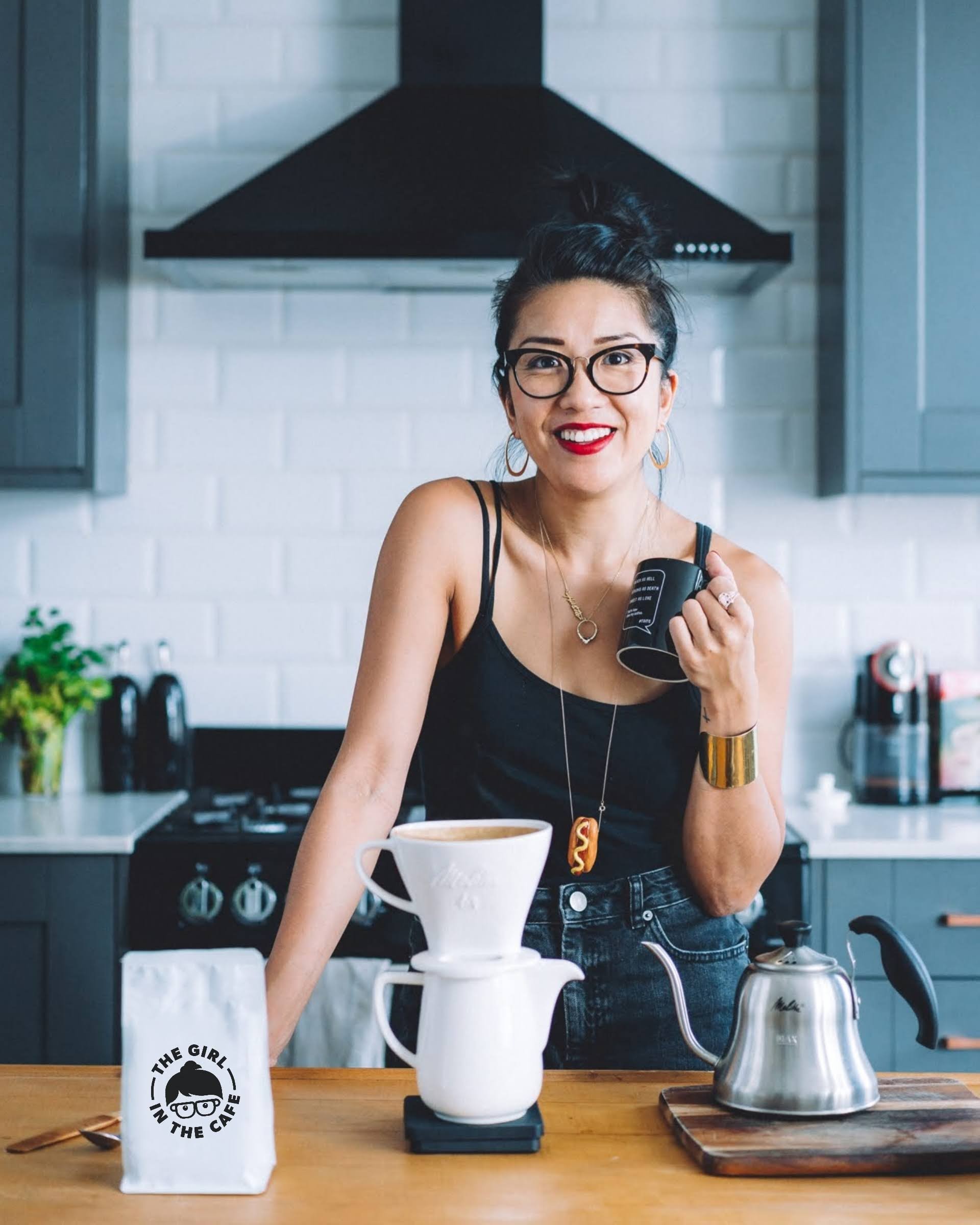 Celeste Wong in a kitchen with a pour over coffee