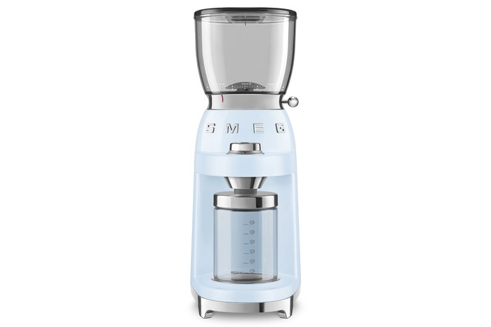 Baby blue Smeg Coffee Grinder with a white backdrop