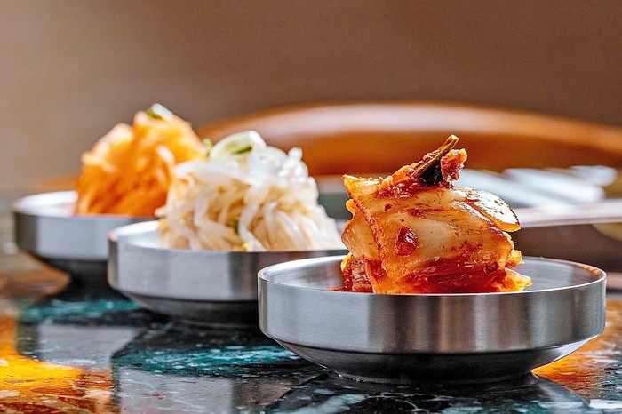 A selection of kimchi small plates at Chung'dam