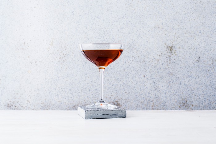 Manhattan Recipe A Manhattan cocktail served in a coupe glass