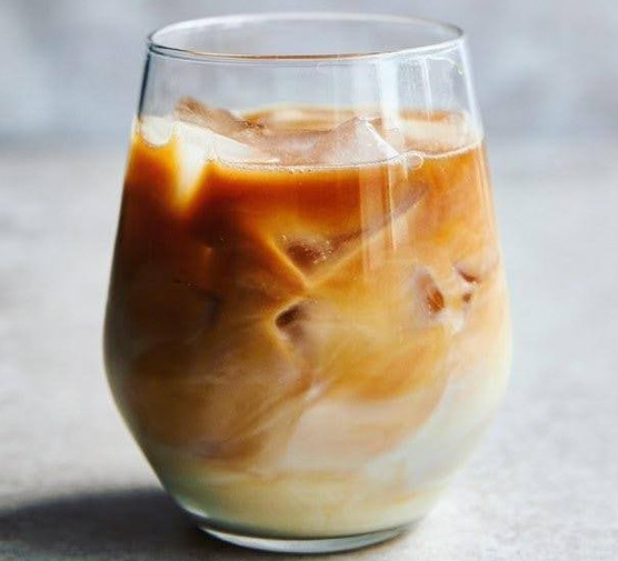 A glass o cold brew iced latte