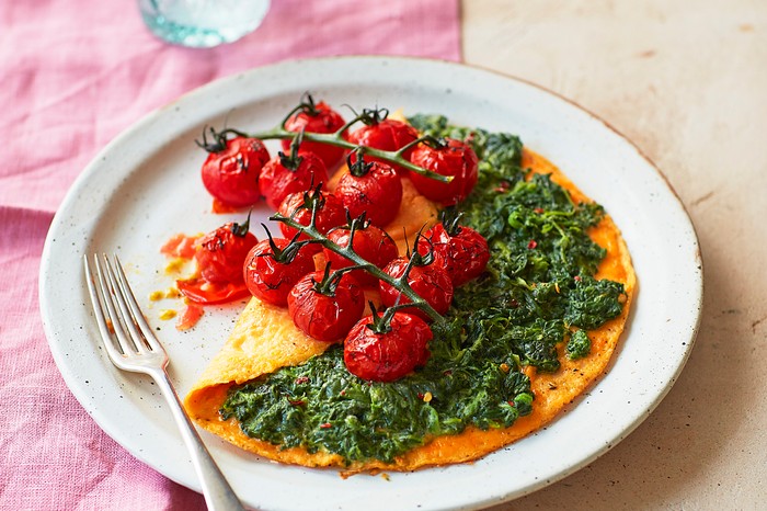 Omelette Stuffed with Spinach with Tomatoes on the Side