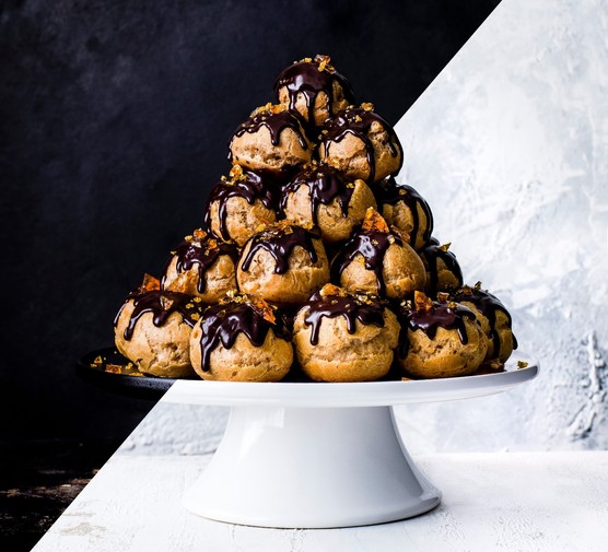 Croquembouche profiterole tower Profiterole tower with dark chocolate and hazelnut topping