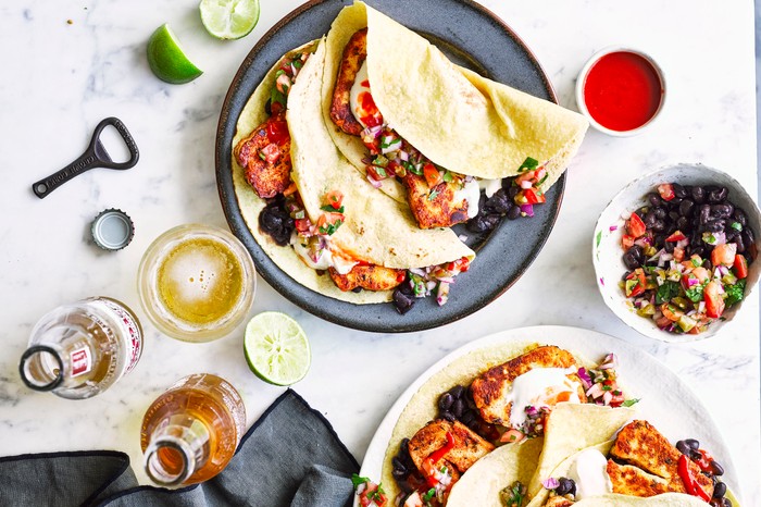 A plate of vegetarian tacos With halloumi and pico de gallo