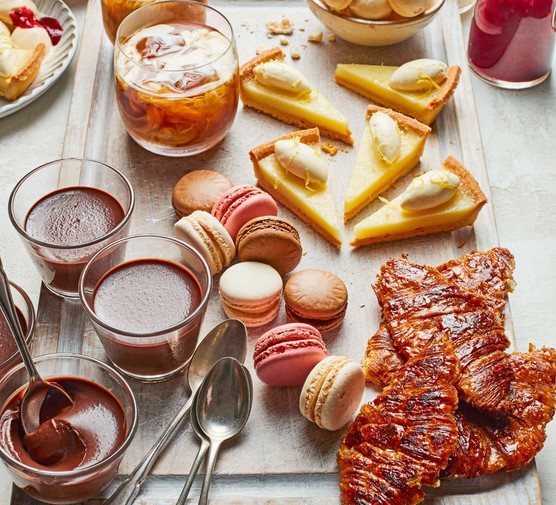 All sorts of bite-sized desserts and cocktails on a sharing platter