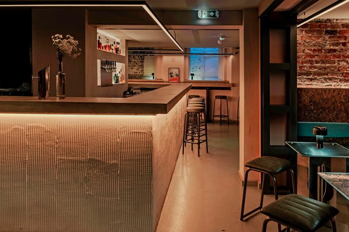 A concrete basement bar Dram Bar