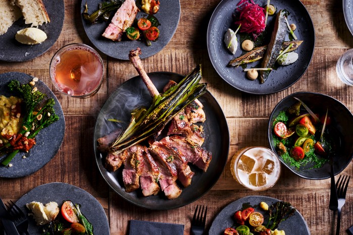 A selection of small and centrepiece meat dishes at wood-fired restaurant Embers