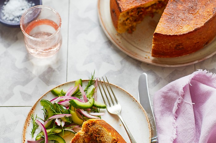 A savoury pie with a slice cut out of it