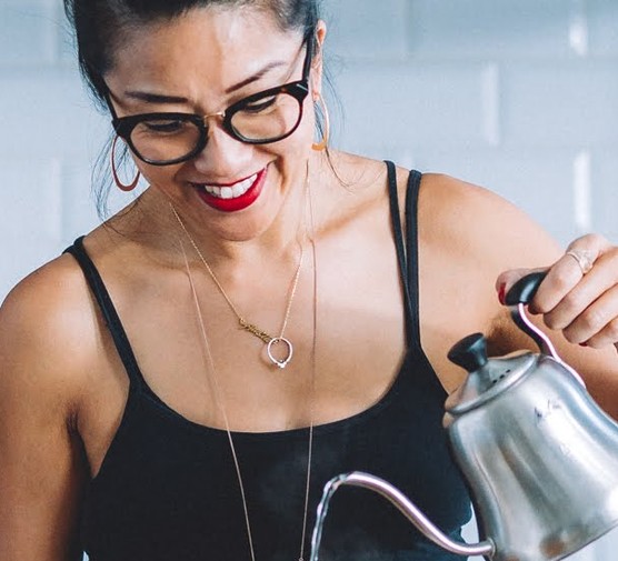 Woman pouring coffee