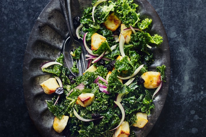 Plate of Kale and Tahini Salad with Chunks of Halloumi