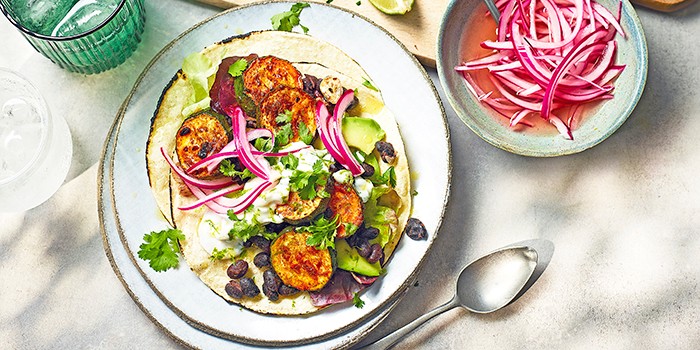 Healthy Courgette Tacos on a Plate with Pickled Onions