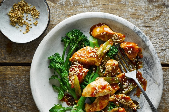Chicken and broccoli stir-fry Chicken breast piece in a honey-sesame sauce with long-stemmed broccoli