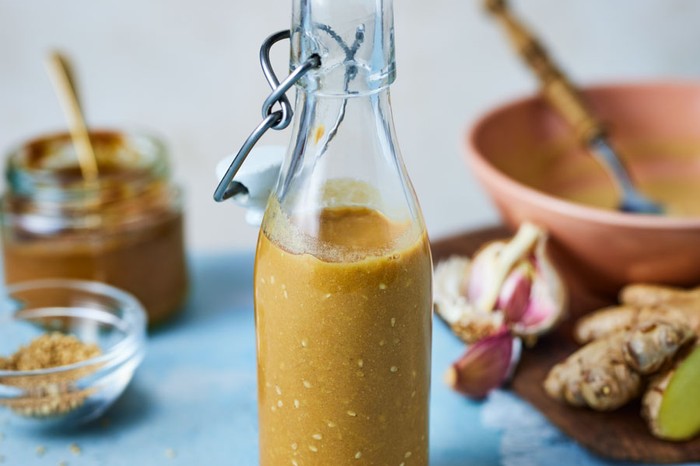 Glass bottle of miso salad dressing