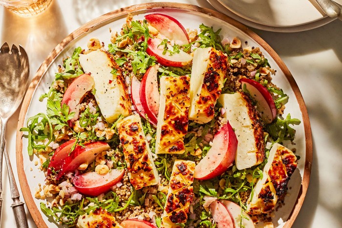 A grilled halloumi salad with nectarines in a large sharing bowl