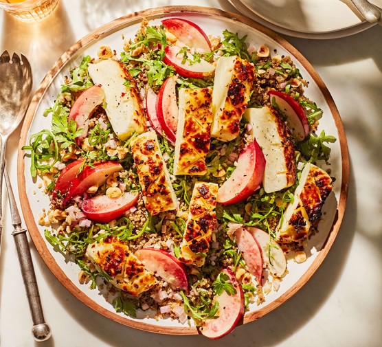 A grilled halloumi salad with nectarines in a large sharing bowl