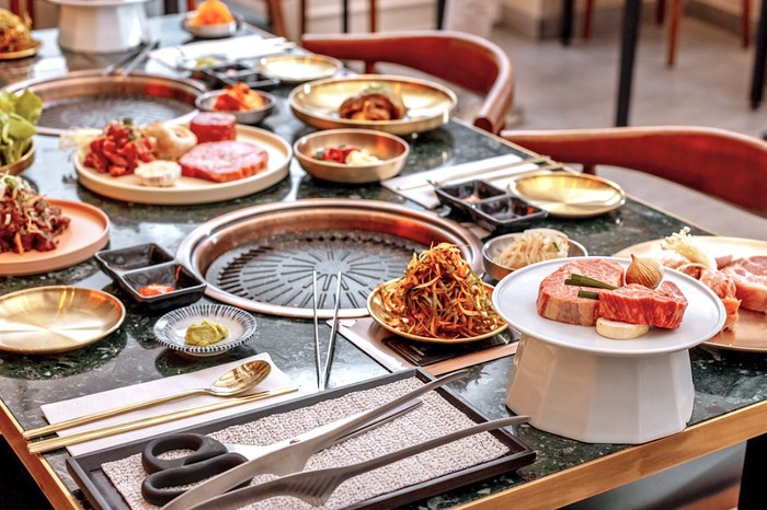 An array of Korean dishes on a table at Chung'dam in Soho