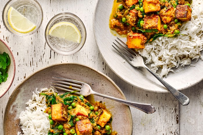 Light Paneer Curry Recipe two plates of paneer curry with rice