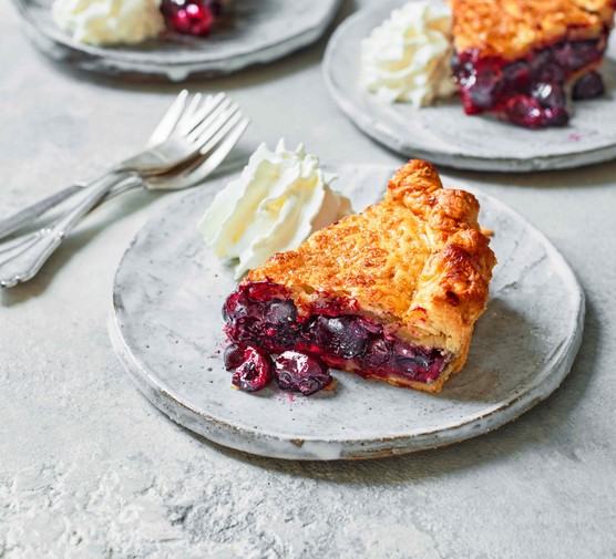 Slice of cherry pie on a plate