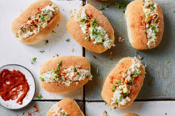 A selection of small rolls filled with crab meat and green avocado