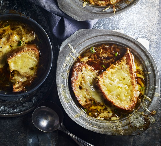 French onion soup Two bowls of French onion soup, topped with cheese toastie
