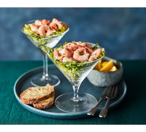 Prawn cocktail served in two cocktail glasses